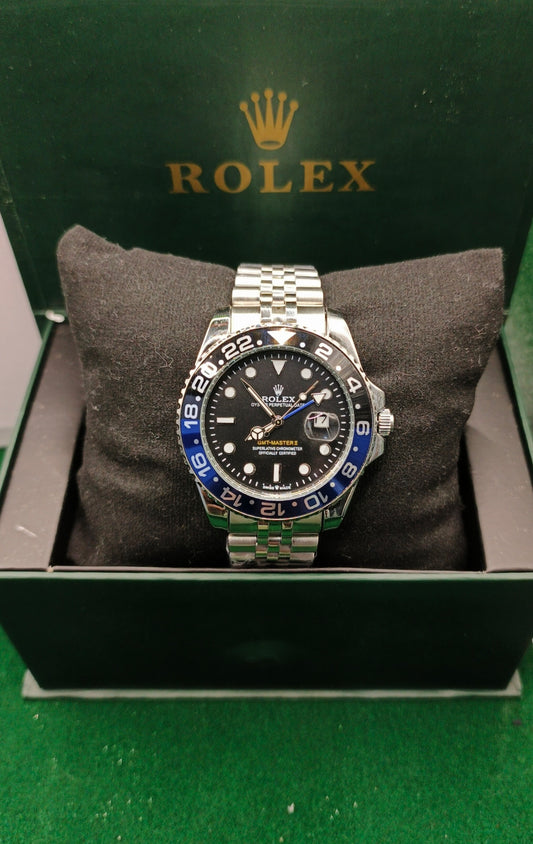 Rolex (GMT) Silver With Rotating Blue & Black Dial With Date
