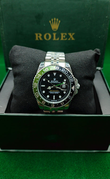 Rolex (GMT) Silver With rotating Green & Black Dial With Date