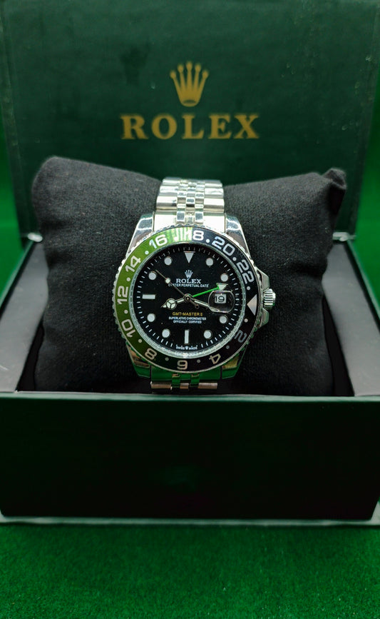 Rolex (GMT) Silver With rotating Green & Black Dial With Date